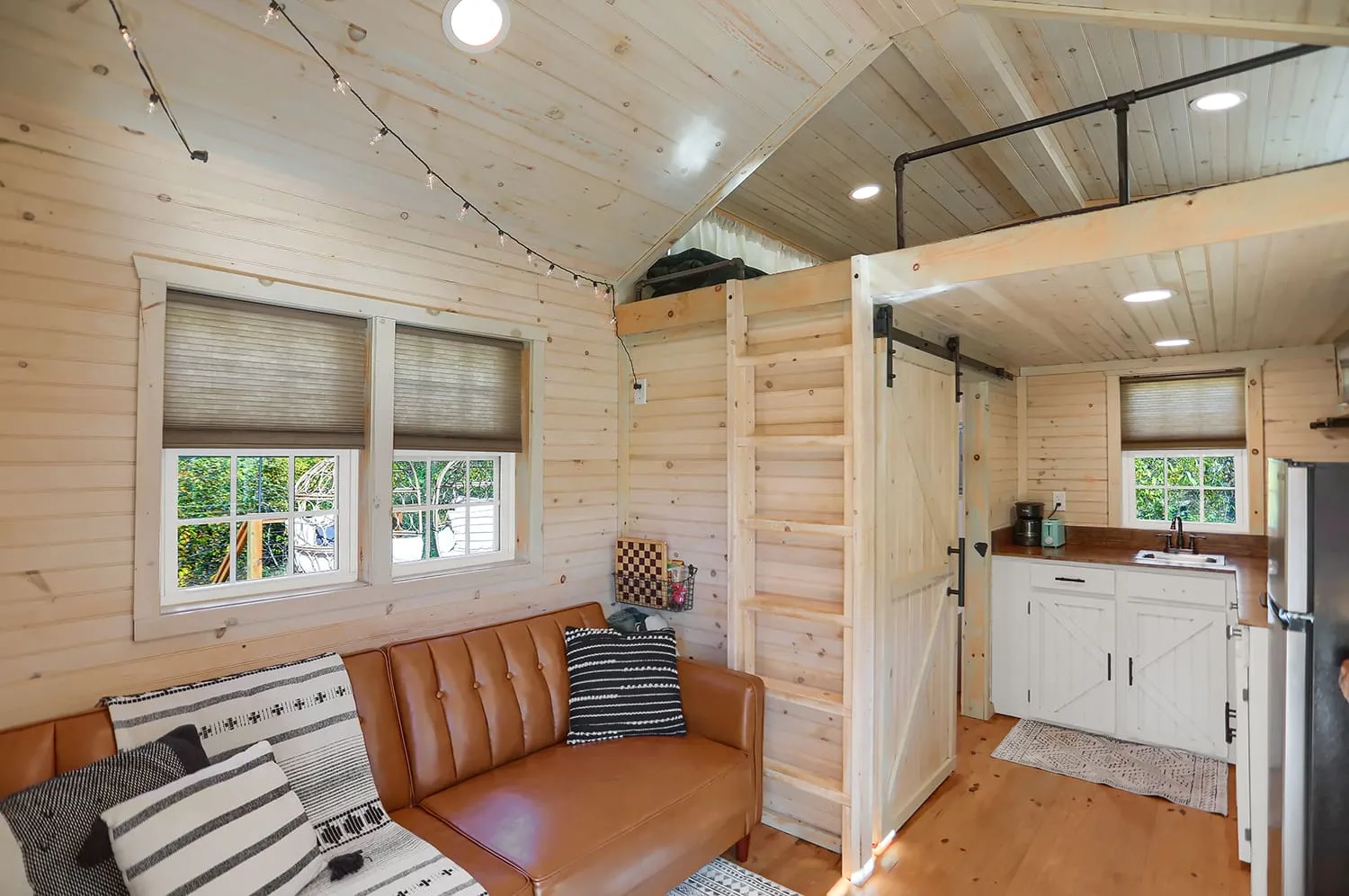 a modern cabin interior of a structure located in the woods