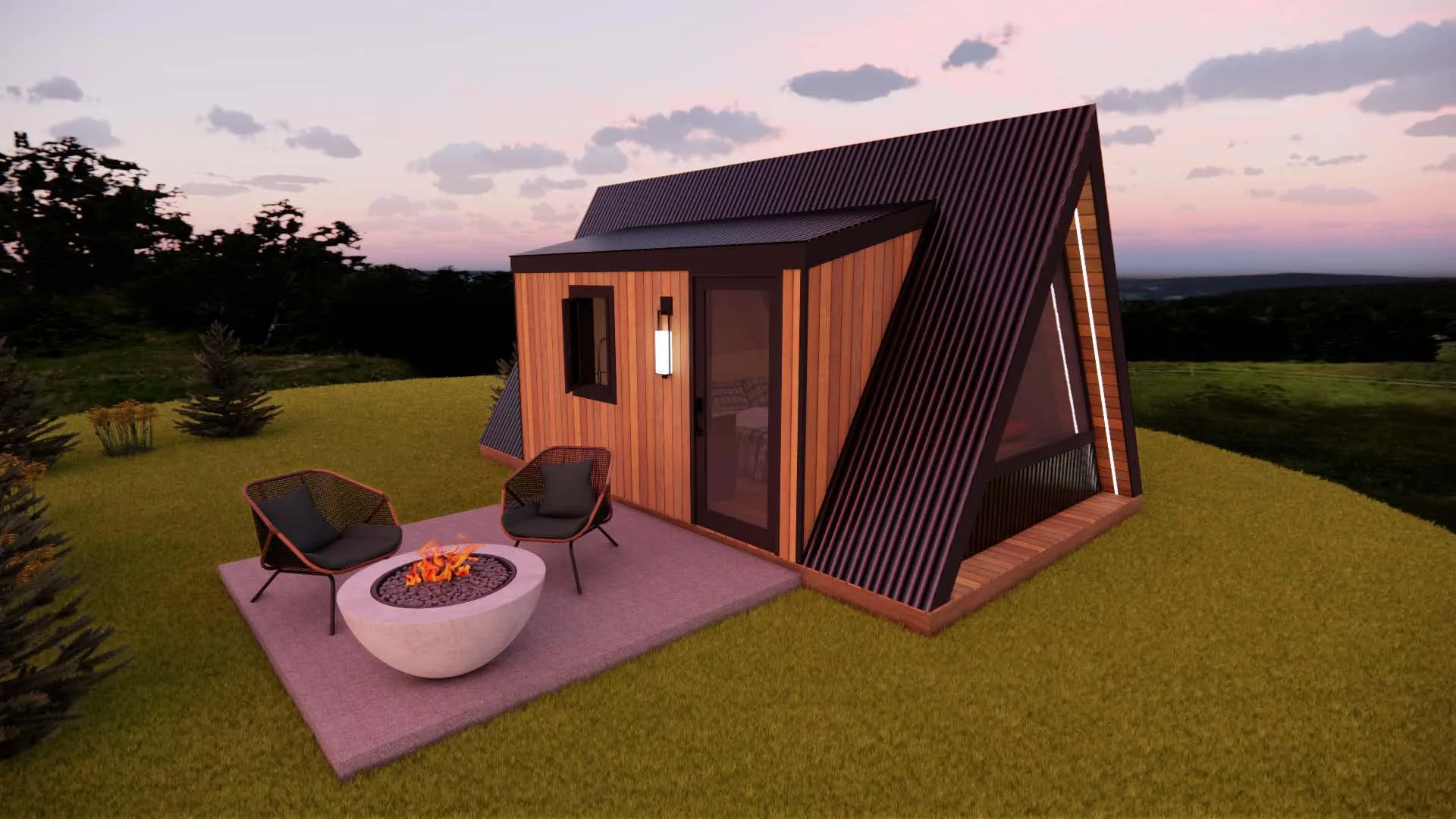 A modern A-frame tiny house with wood siding, large glass windows, and an outdoor patio featuring two chairs and a round fire pit on a grassy lawn at sunset.