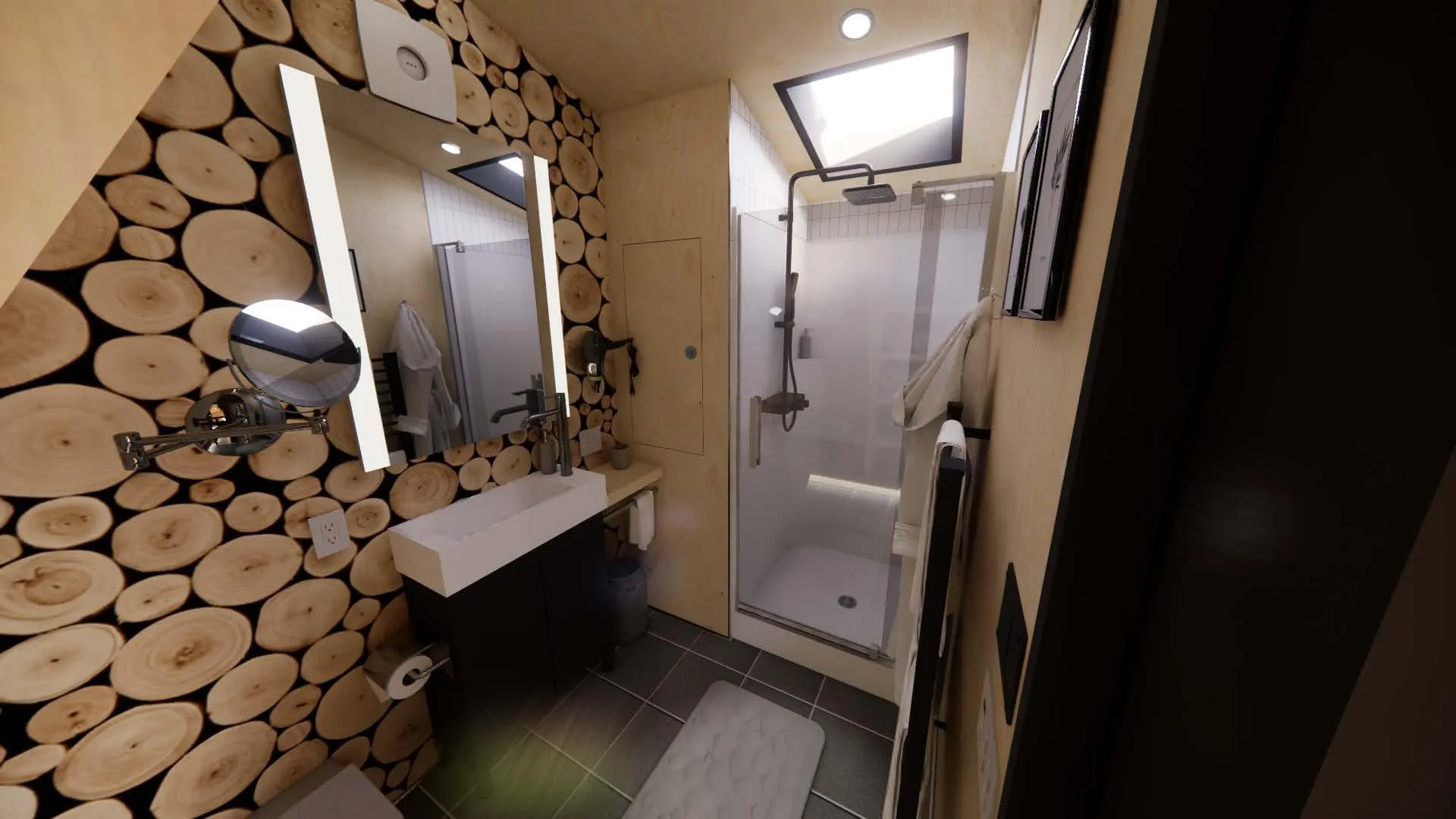 A modern bathroom with a shower, rectangular sink, circular mirror, and a wall decorated with cut wood slices.