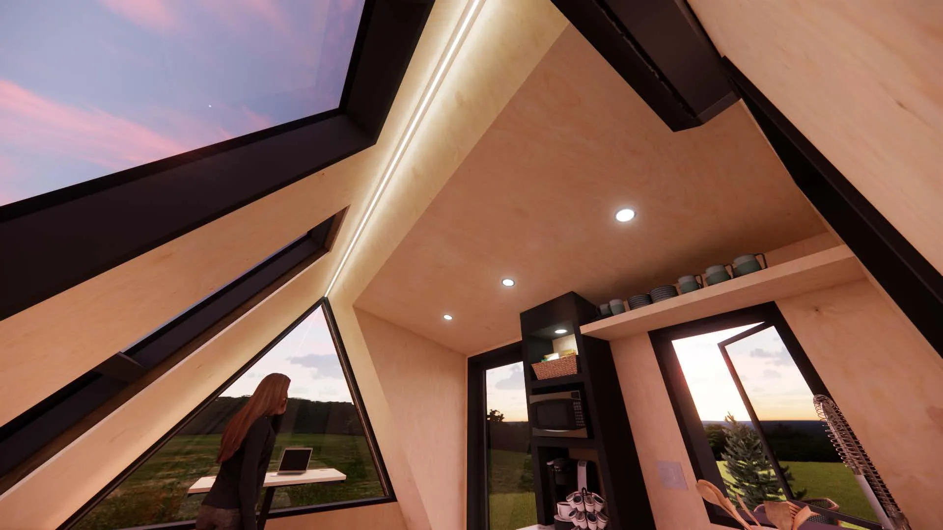 Interior of a modern tiny house with triangular windows, wooden walls and ceiling, a small kitchen area, and a person standing by a table looking outside.