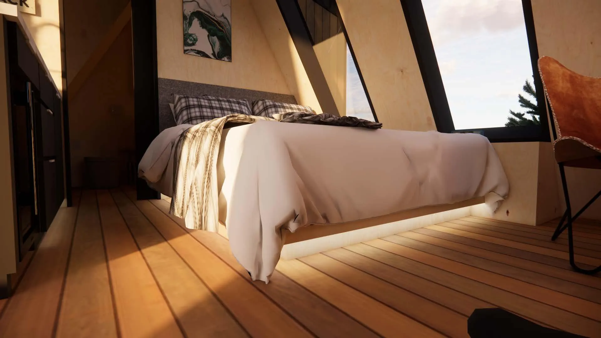 A neatly made bed with plaid pillows and a blanket sits in a modern room with wood floors, large windows, and natural light.