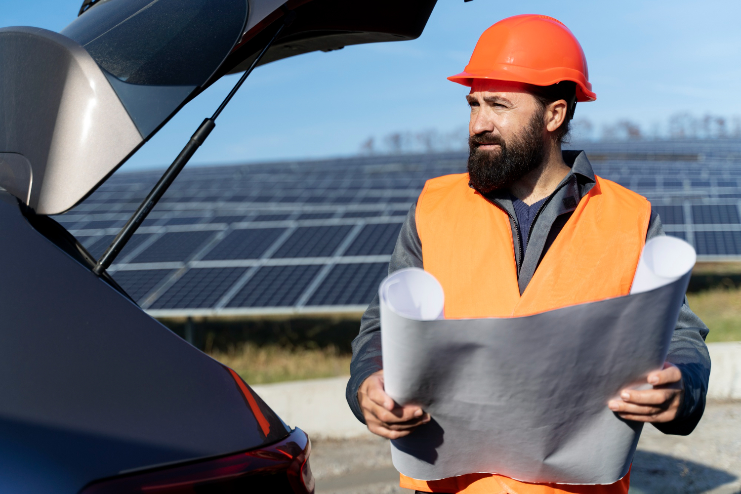 Solar technician installing rooftop panels