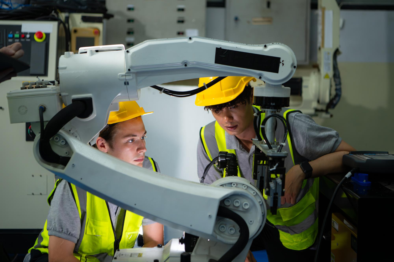 Technicians working with robots
