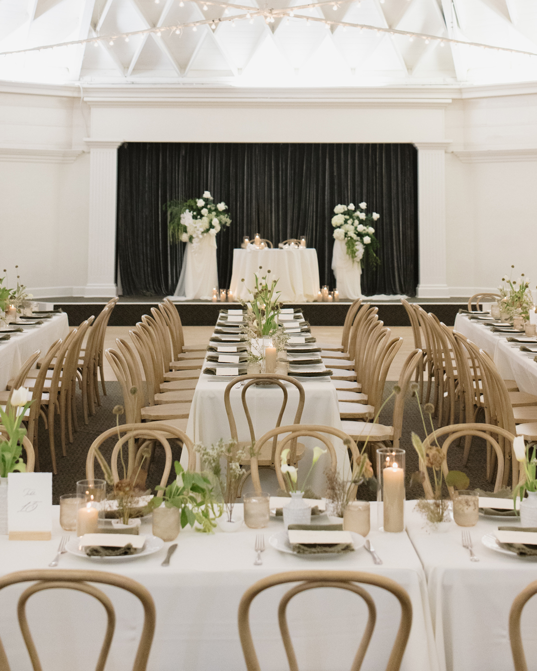 Modern, coastal wedding reception decor decorated the indoor ballroom at The Casino.