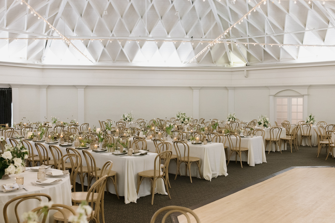 Modern, boho design decorates the domed ceiling ballroom for a wedding reception at The Casino San Clemente.