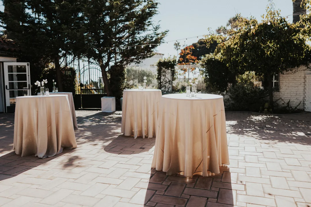 Cocktail tables are set on the Patio of the Stars.