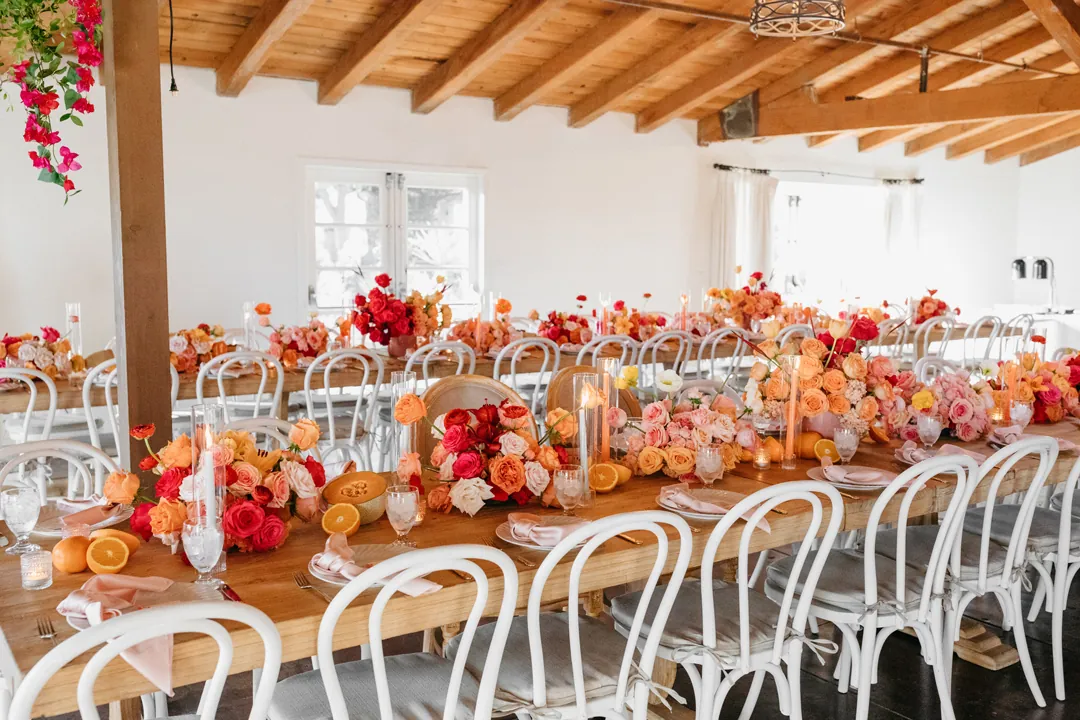 Colorful summertime wedding decor fills the West Wing at The Casino.