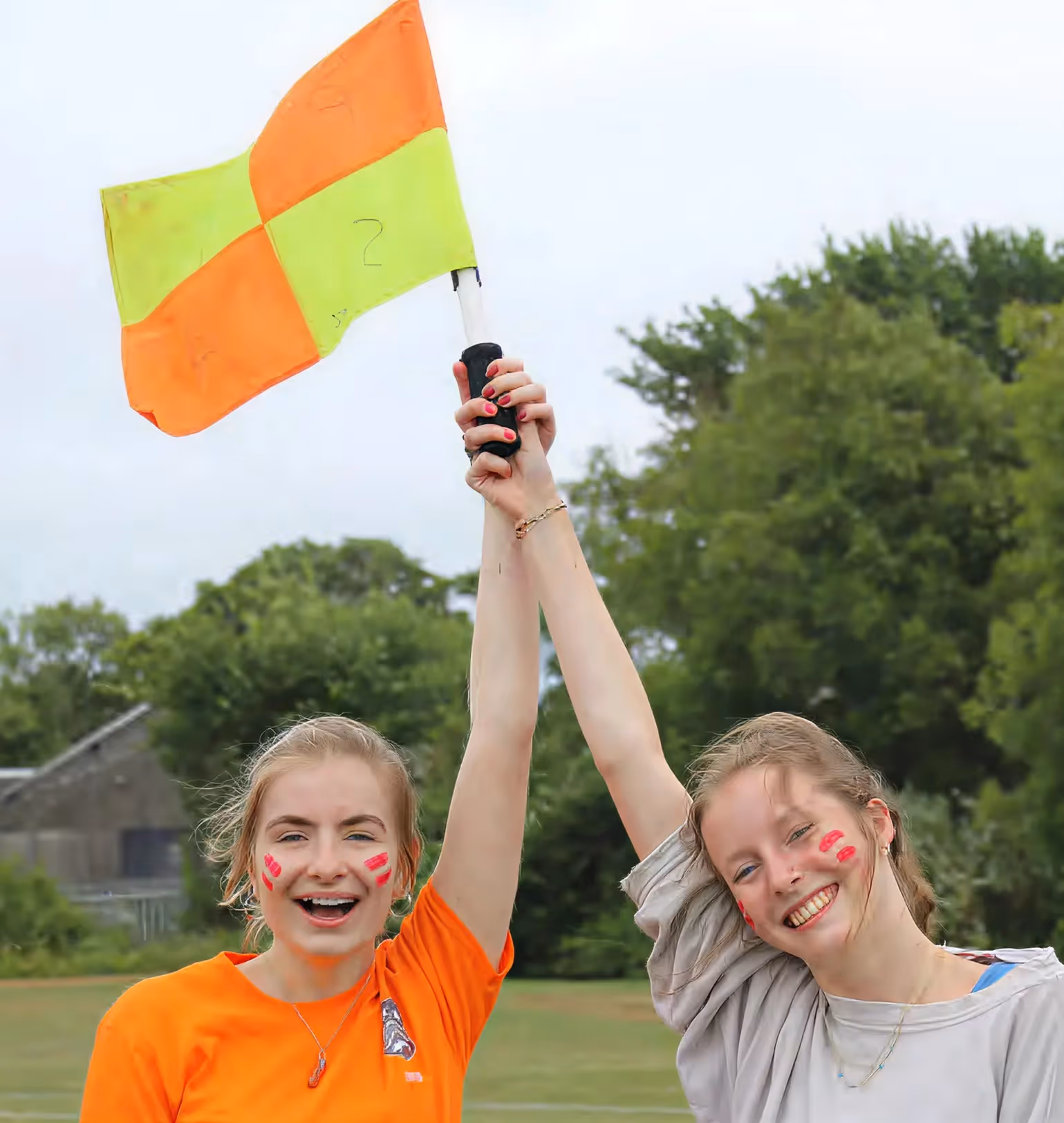 Students Holding Flag
