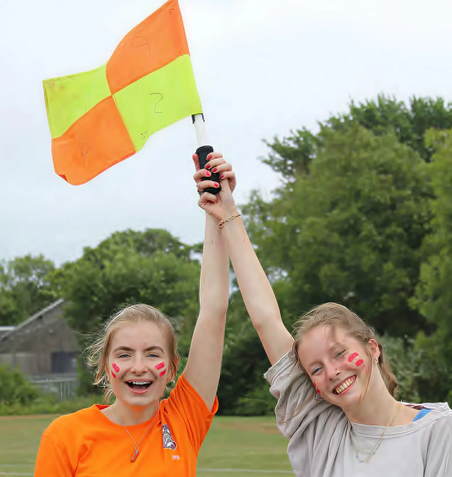 Students Holding Flag