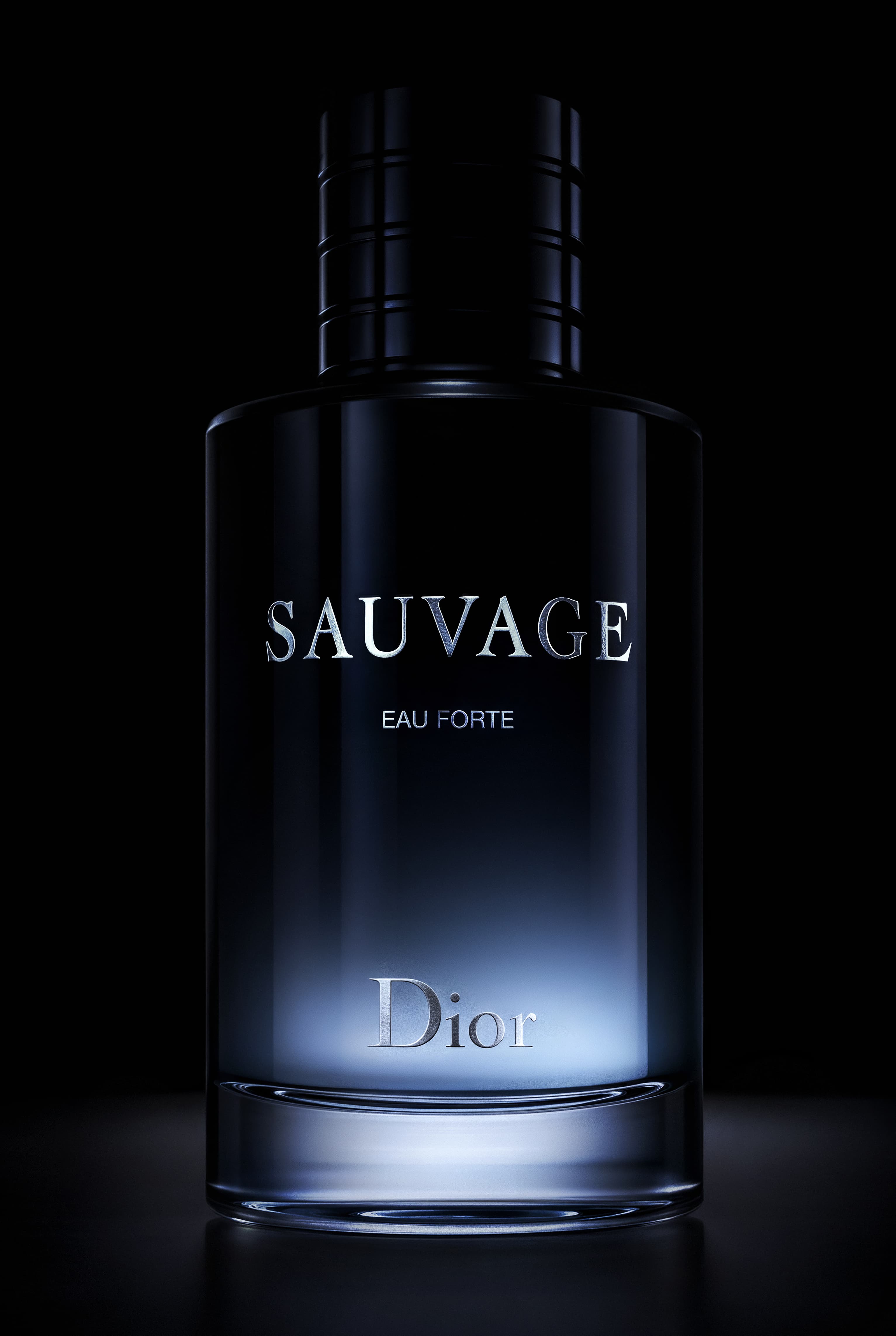Dior Sauvage Eau Forte perfume bottle with dark blue gradient and silver lettering on black background.