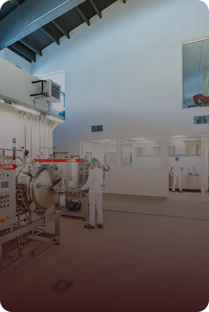 Portrait of a man sitting on a chair, looking forward.