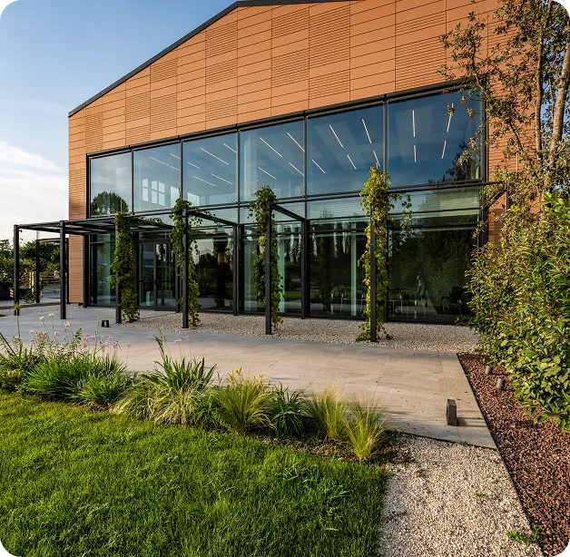 Wind turbine blades against a landscape.