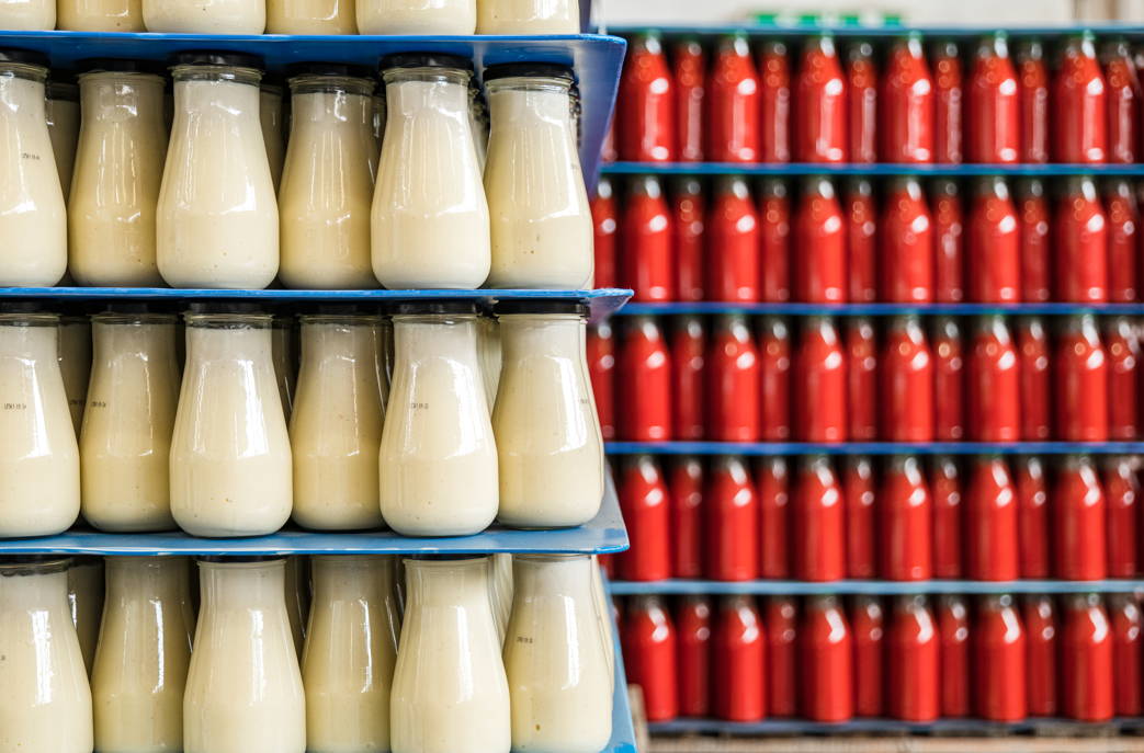 Wind turbine blades against a landscape.