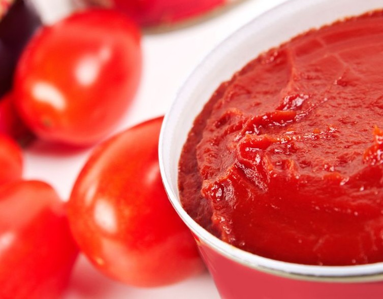 Wind turbine blades against a landscape.