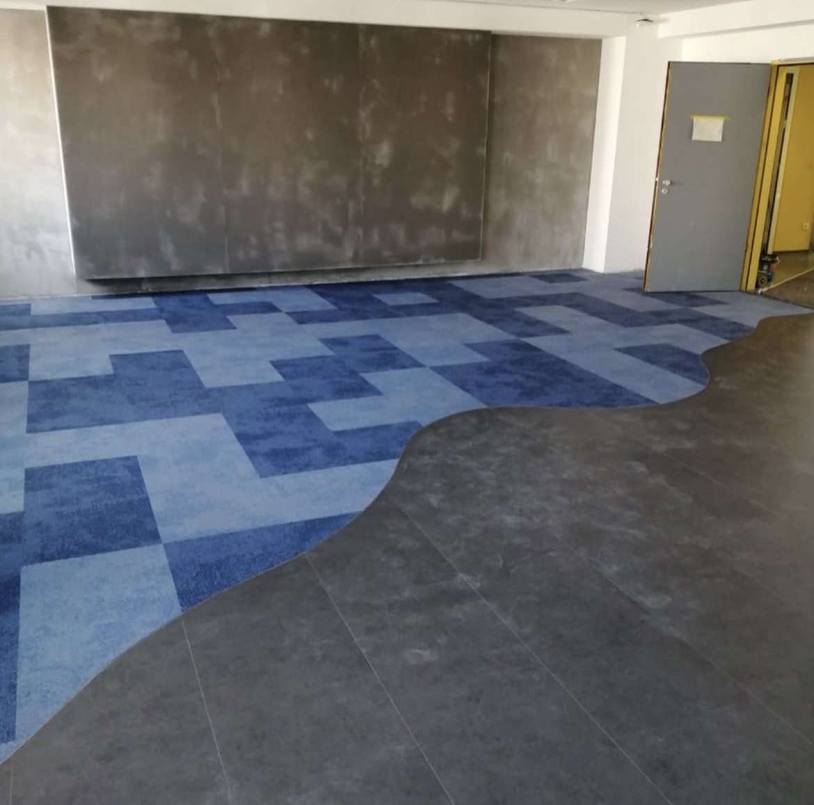Küberit bending machine shaping a flexible aluminium flooring profile