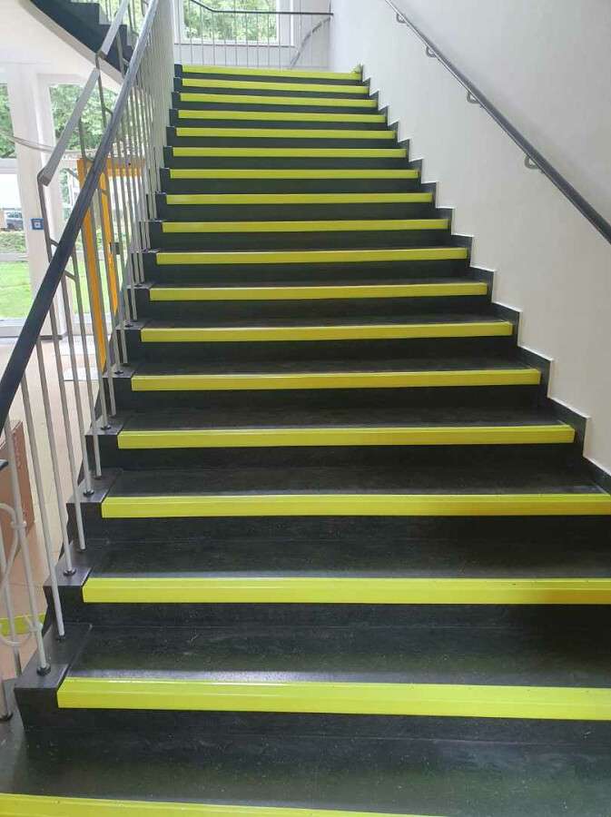 Küberit aluminium stair nosing on a retrofit staircase