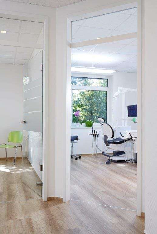Küberit movement joint profile on LVT flooring