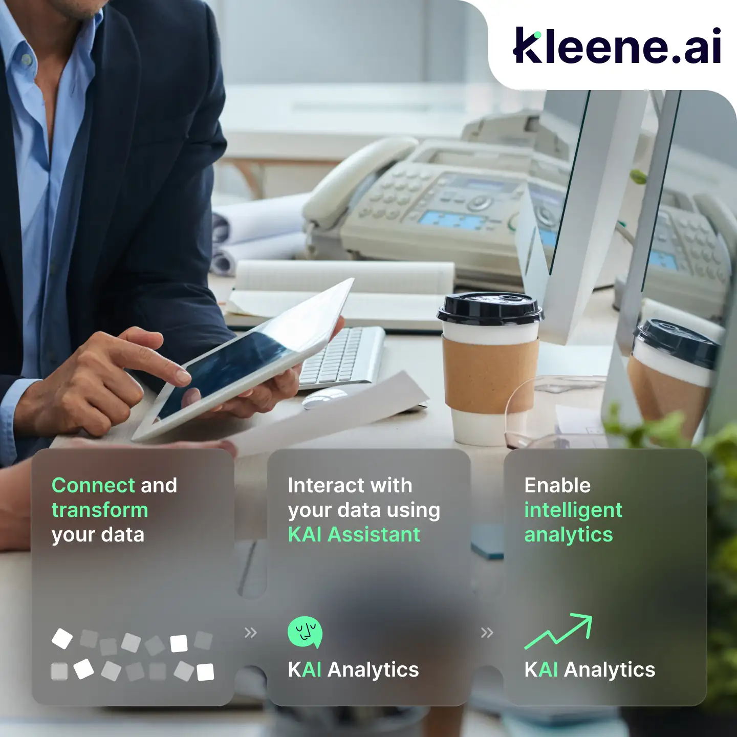 Businessman working at office desk with tablet and coffee cups, kleene.ai branding.
