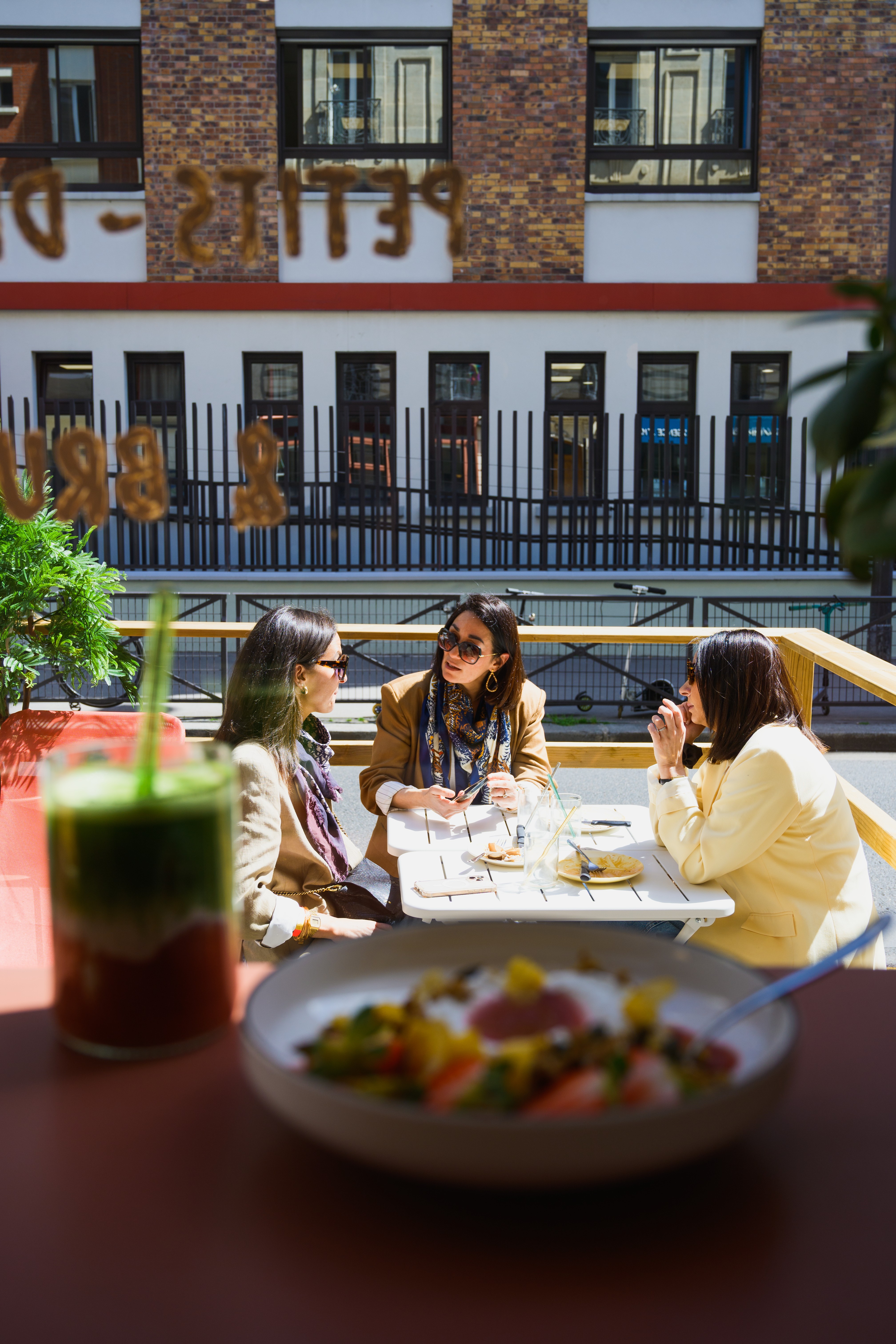 Guests sharing a restaurant table during a daytime service