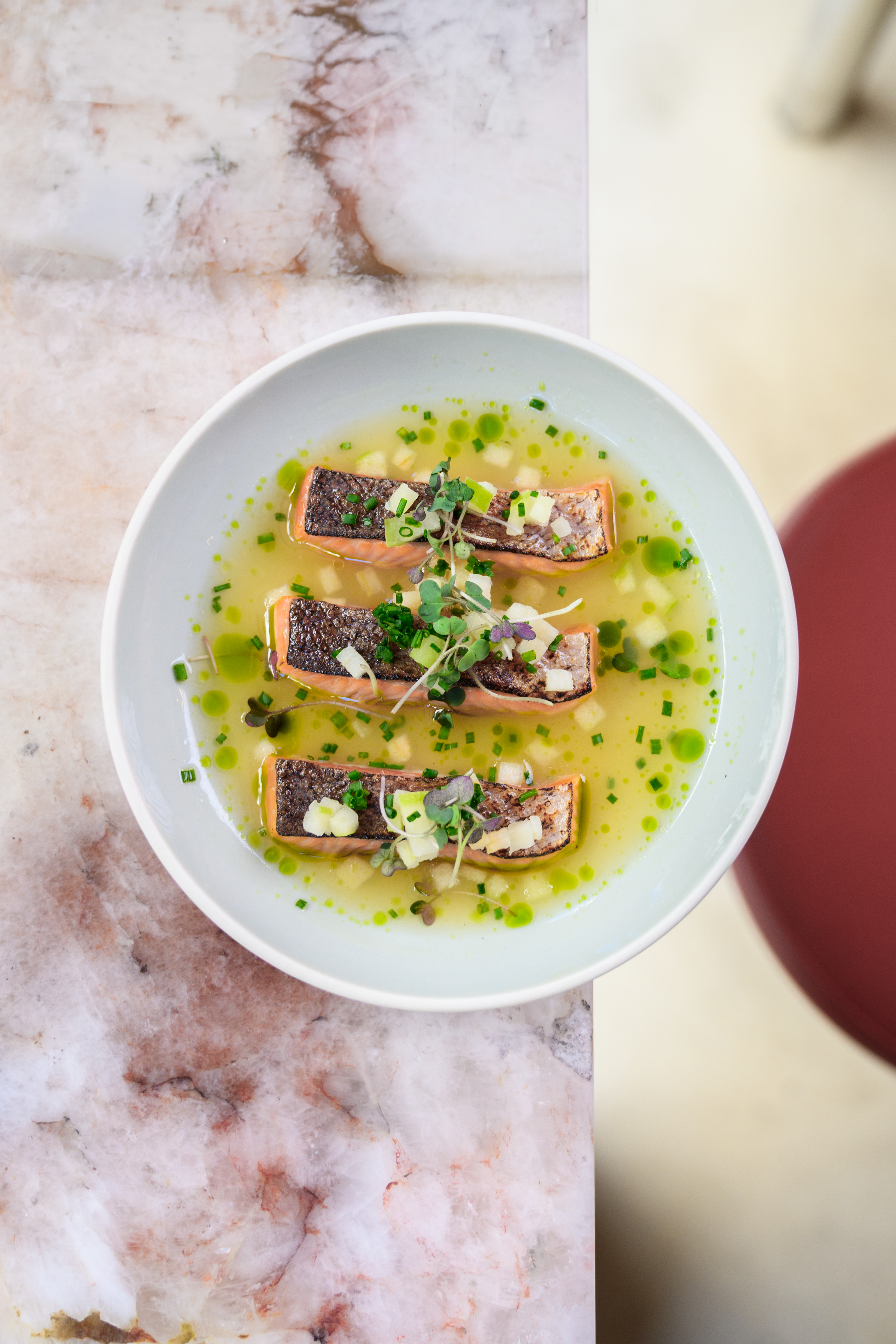 A precisely composed restaurant dish photographed from above