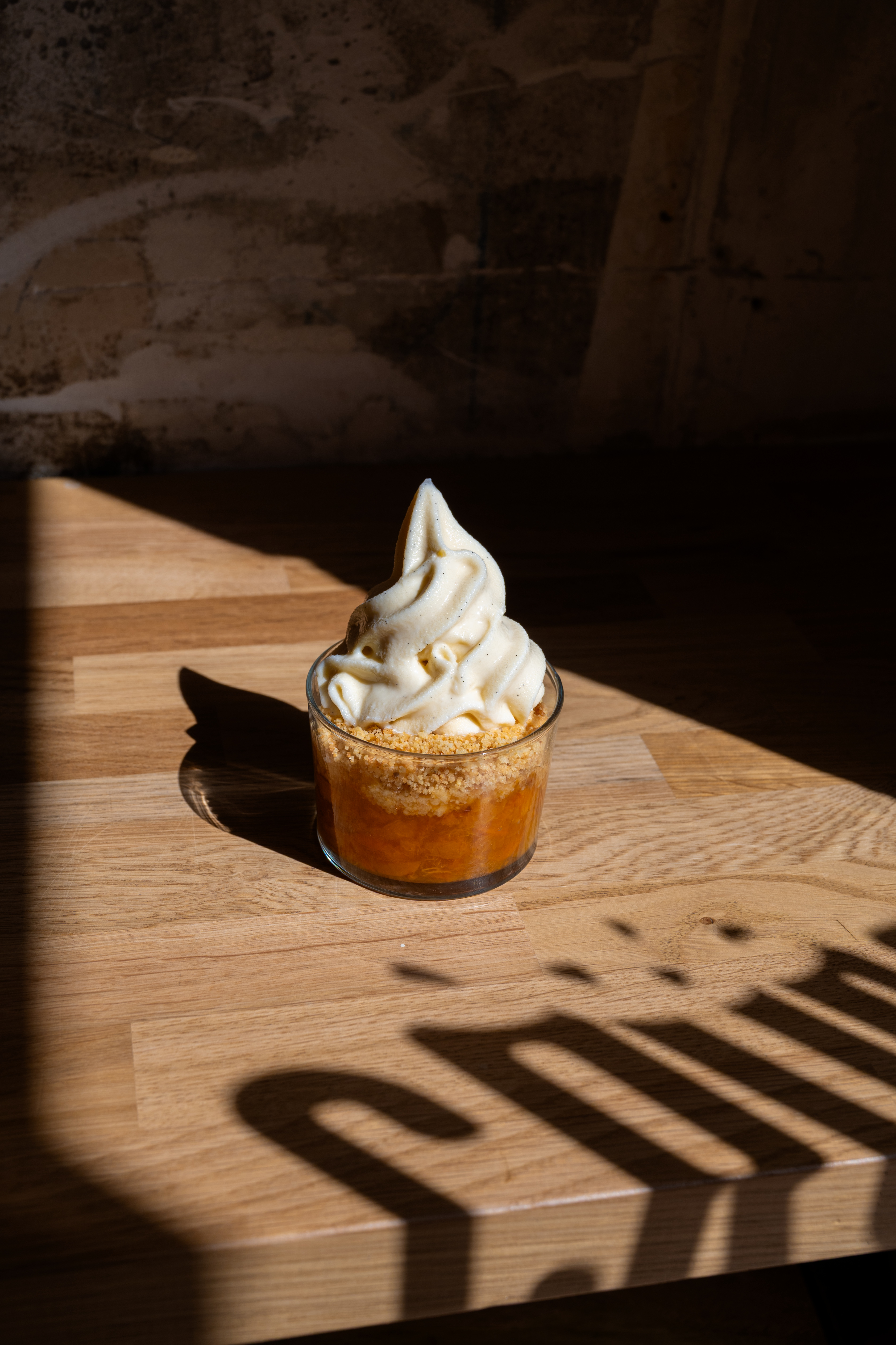 A hotel restaurant dessert photographed in warm natural light