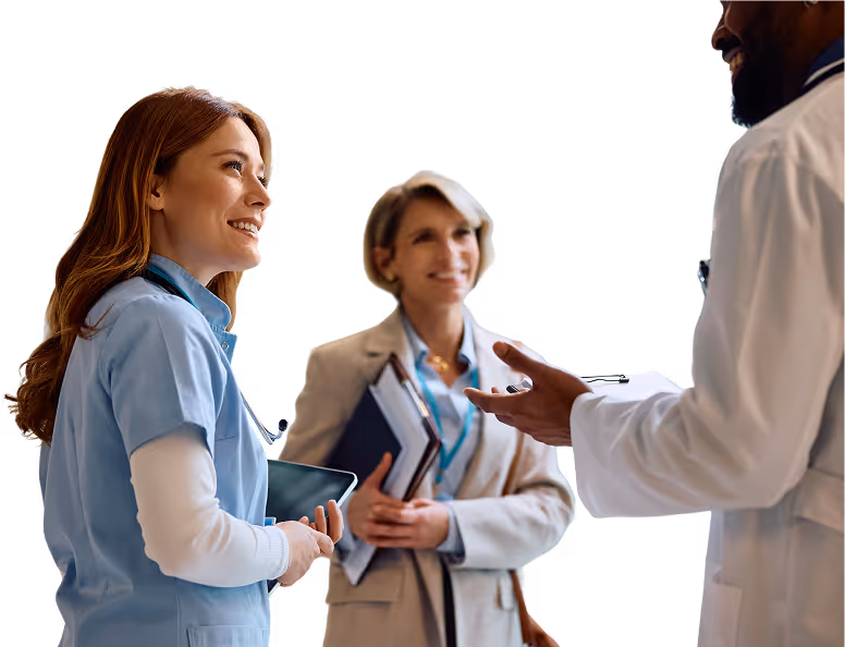 Female doctor in white lab coat holding folders and a tablet, smiling and looking to the side.