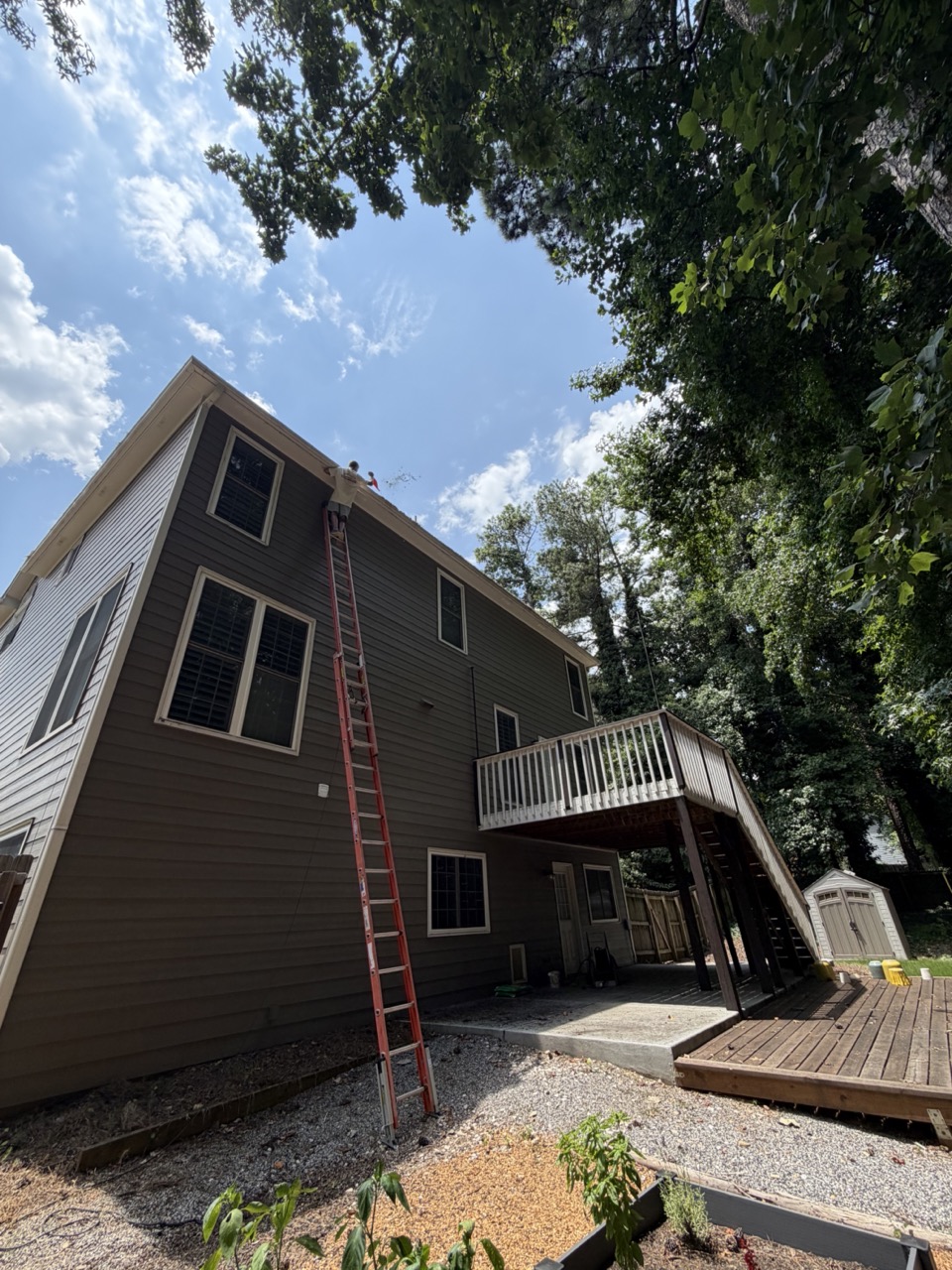 Gutter cleaning in progress