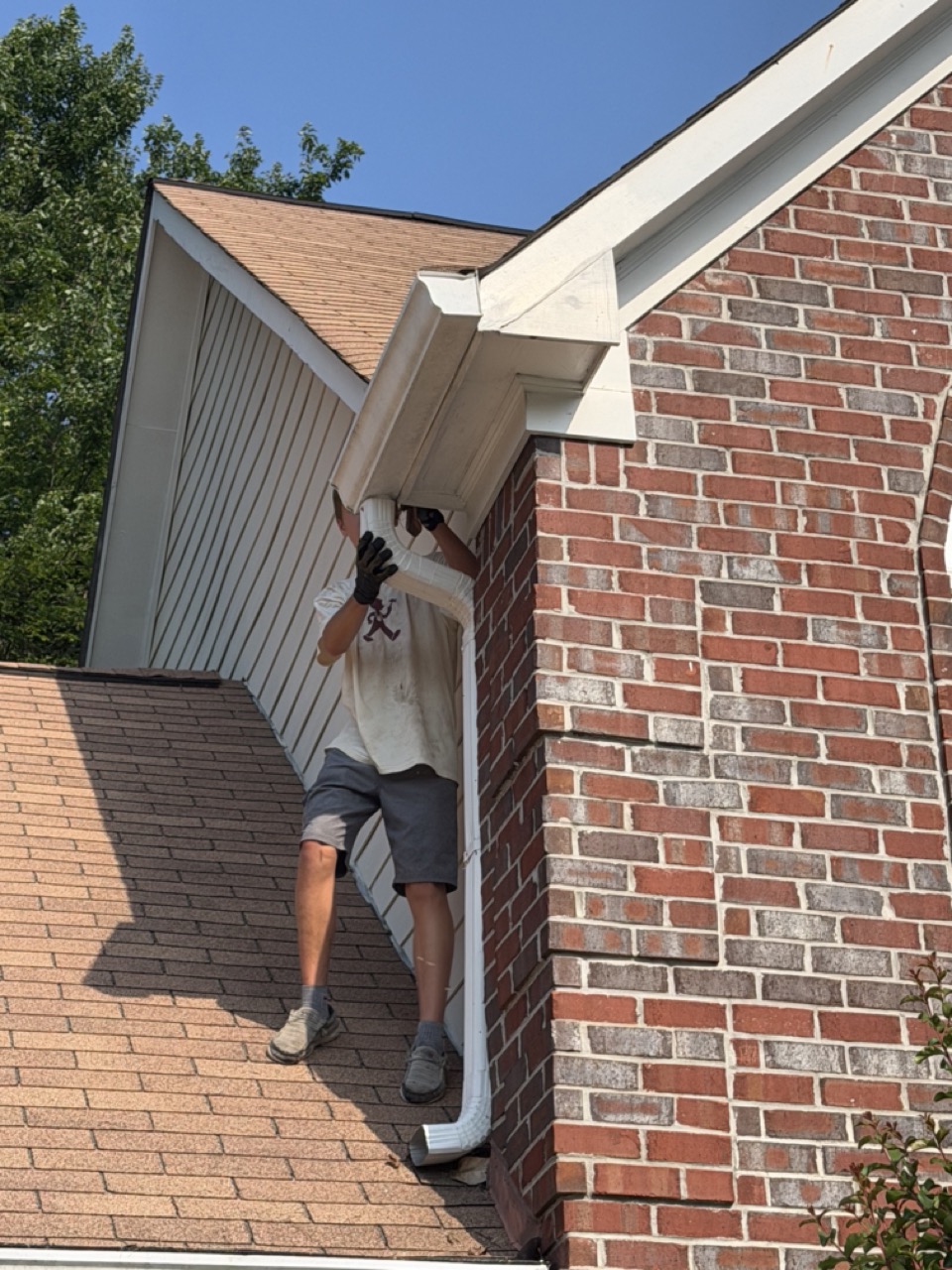 Reattaching the loose front downspout