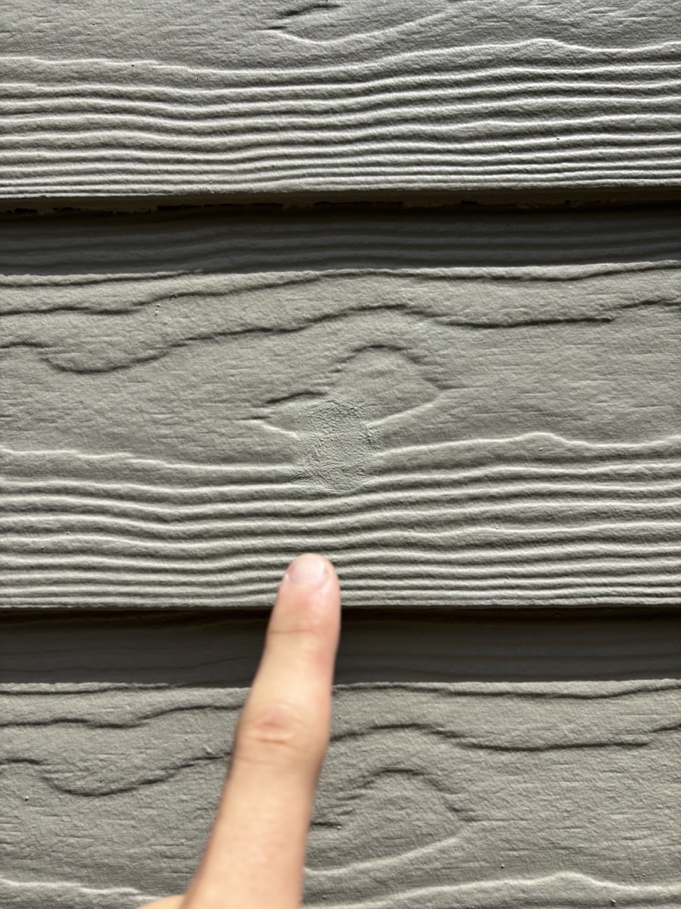 Siding dent, repaired