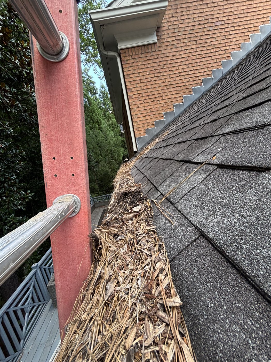 Gutter full along the roof edge