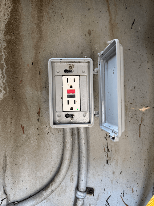 New GFCI outlet installed in a weatherproof in-use cover