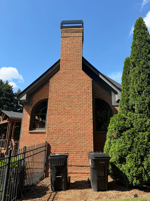 Gable end and chimney before the fascia was repainted