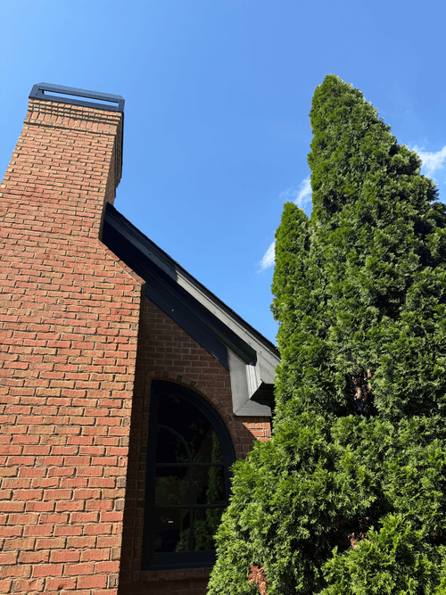 Second view of the chimney fascia before repainting