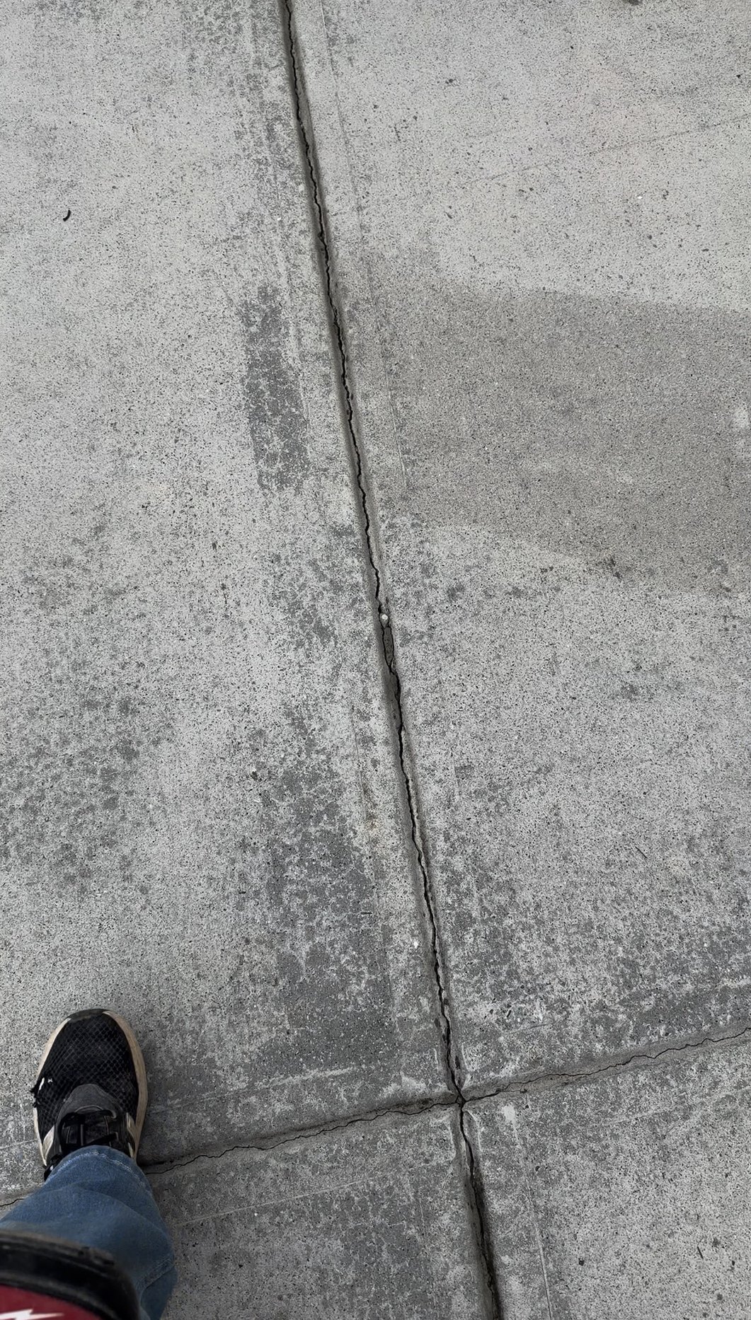 Driveway control joint open along its full length before sealing