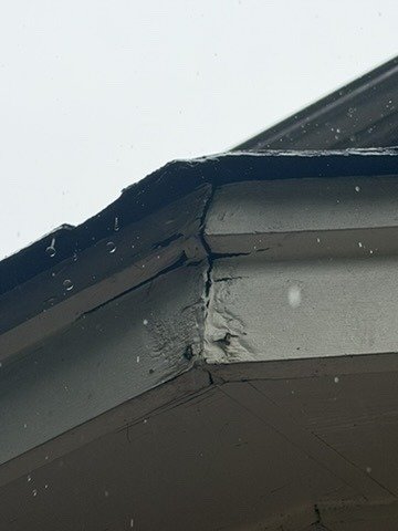 Failed sealant at a gutter miter seam