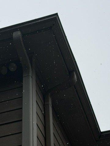 Gutter corner and downspout