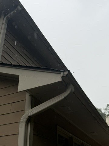 Gable end gutter and downspout
