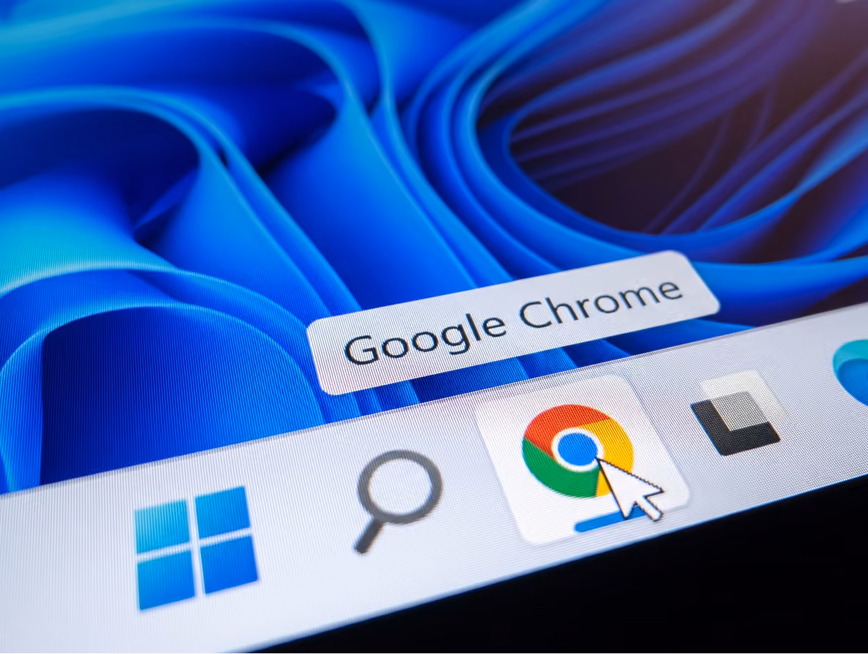Computer taskbar showing Windows start icon, search icon, and mouse cursor on Google Chrome icon.