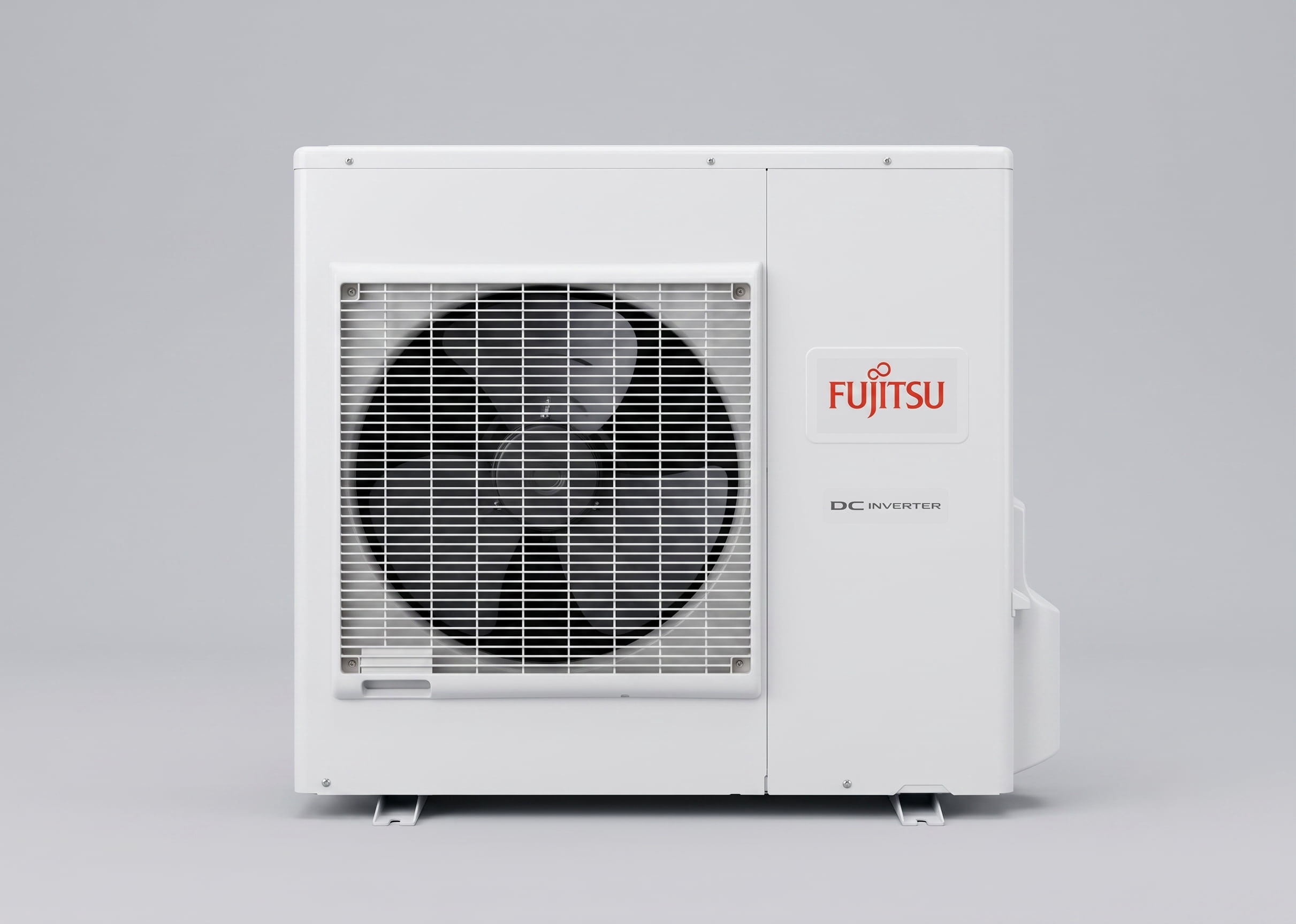 Fujitsu DC Inverter outdoor heat pump unit mounted on wall brackets, showing the external fan grille and white casing