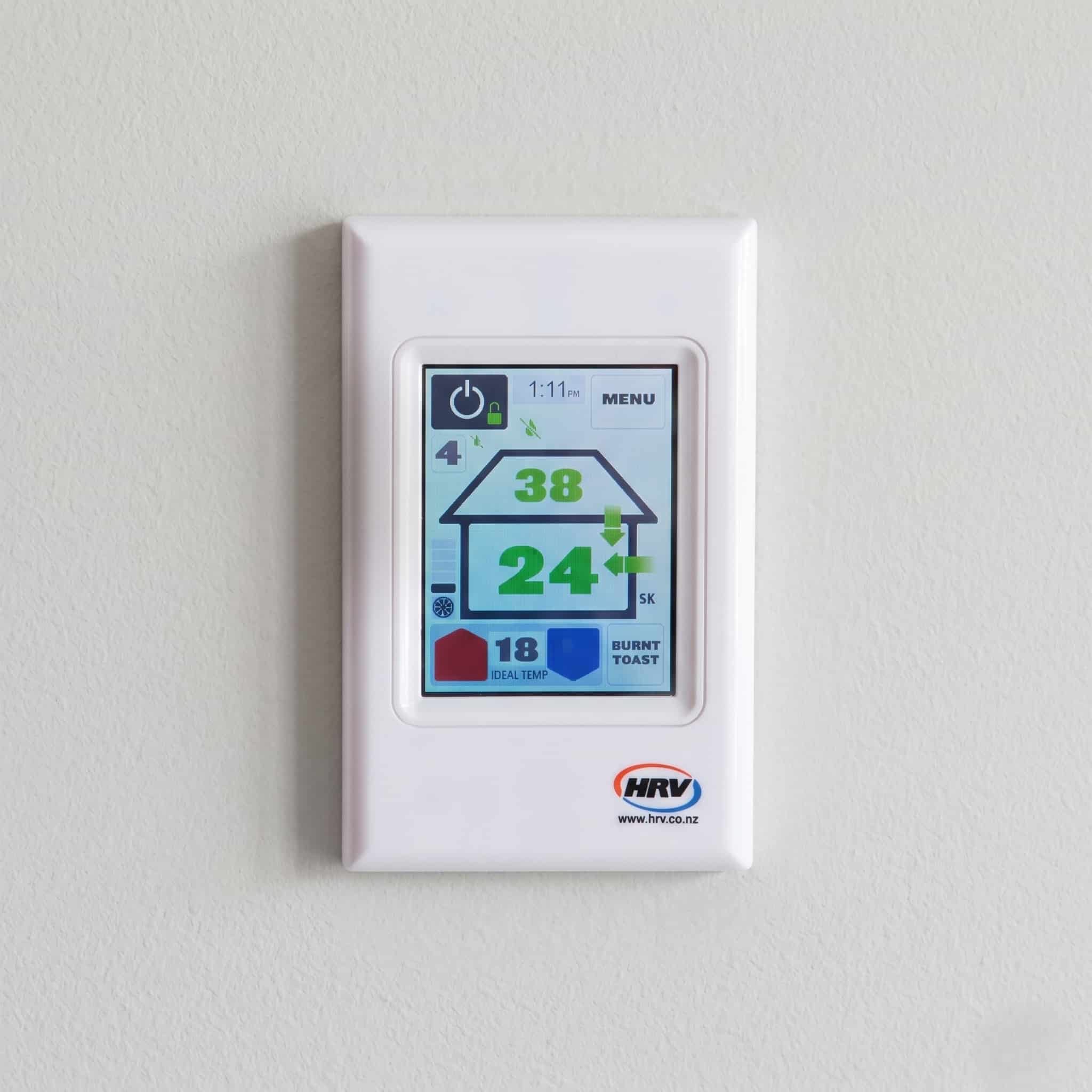 HRV AirSense touchscreen controller in green ventilation mode showing roof temp 38, house temp 24, ideal temp 18