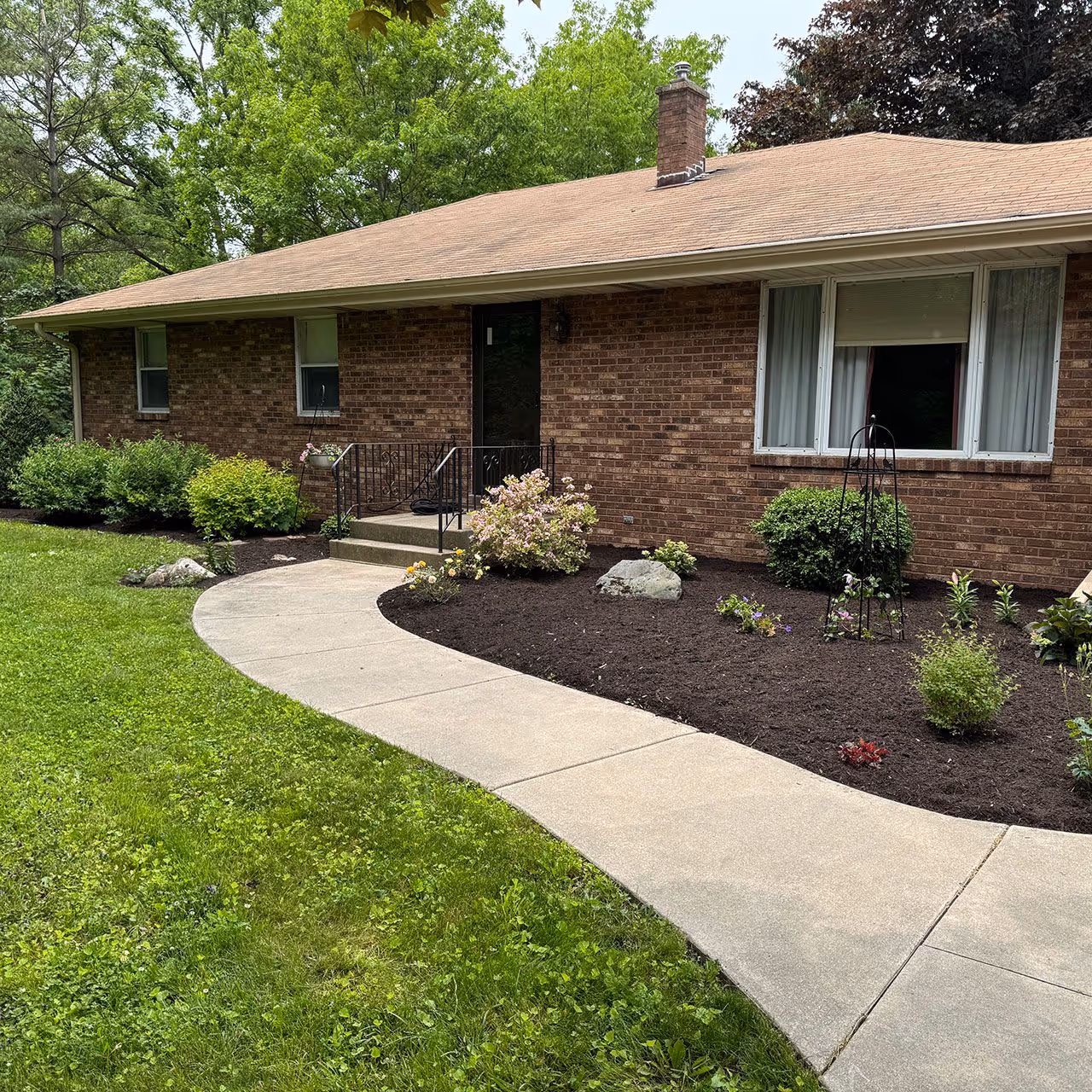 fresh mulch installation and landscaping enhancement by Jeff's Lawn And Snow in Kenosha and Racine Counties Wisconsin