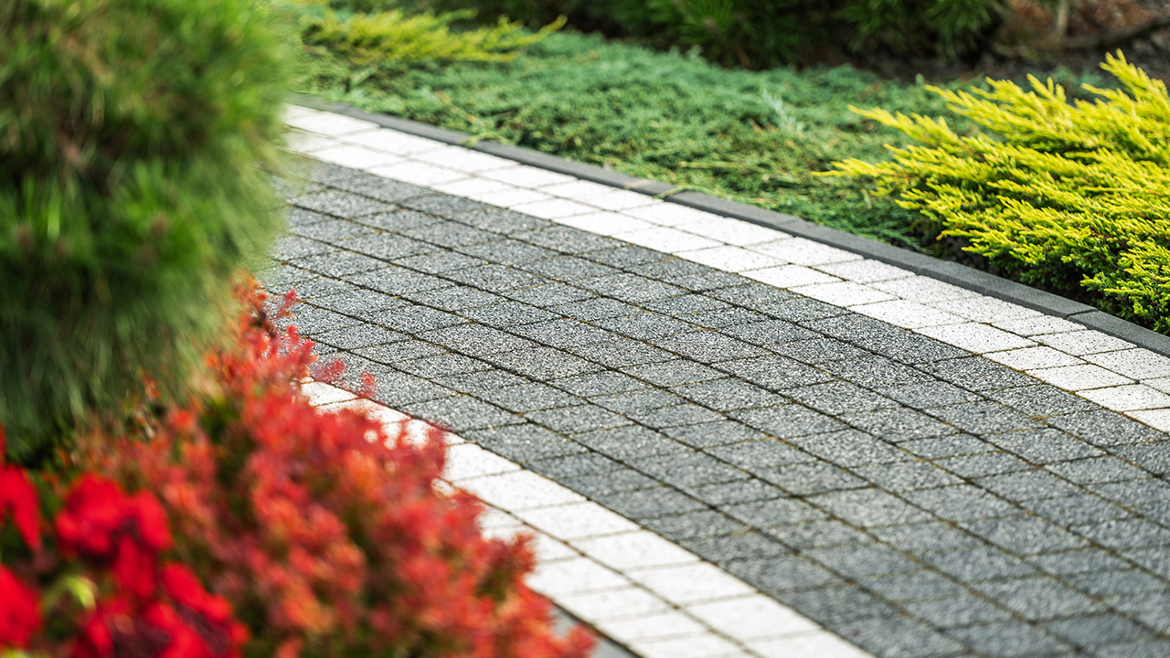 Paver Patio walkway installation by Jeff's Lawn and Snow
