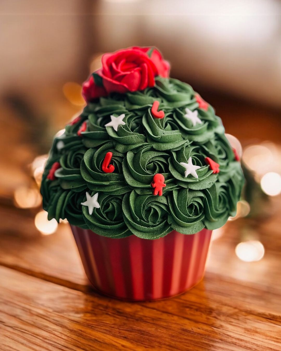 Top view of a red rose bouquet with a heart-shaped tag reading 'Happy Valentine's Day'.
