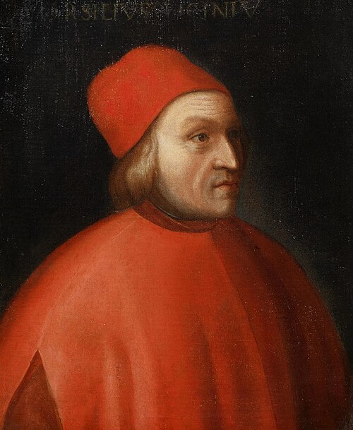 Portrait of Marsilio Ficino in a bright red cap and cloak against a dark background, looking toward the right.