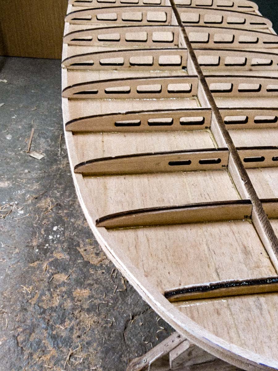 Internal wooden rib structure of a hollow surfboard prototype.