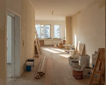 A room under construction with visible building materials, highlighting active project development and high-quality architectural execution.