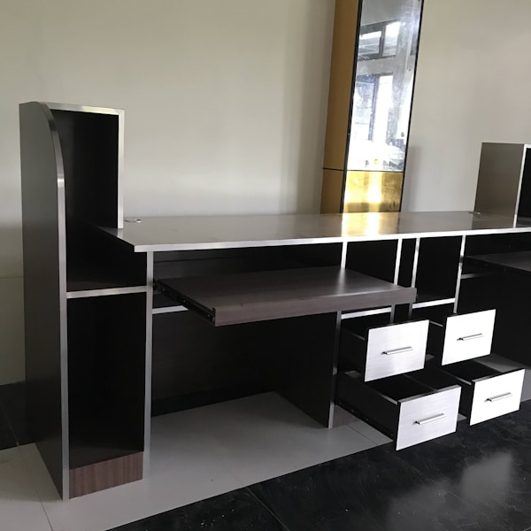 a desk with a computer on it