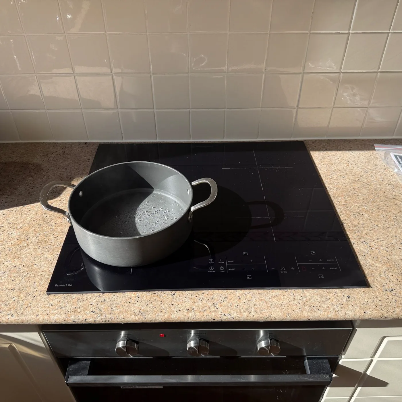 Close-up of the new induction cooktop in a Strathfield kitchen