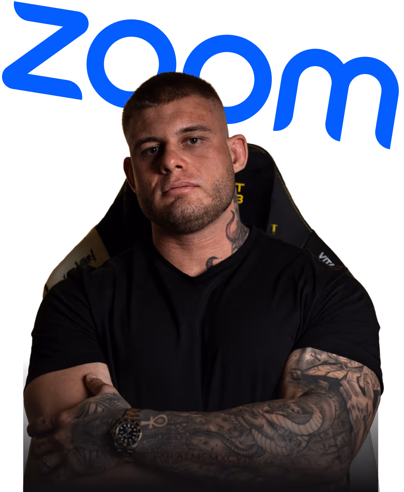 Man with tattoos on arms and neck sitting in a gaming chair with the blue word 'zoom' above.