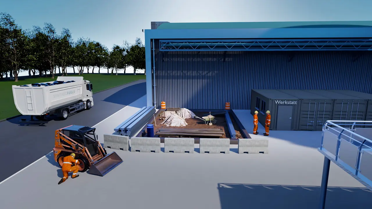 Baustellenszene mit zwei Arbeitern in orangener Schutzkleidung, Bagger, Lastwagen und Gebäude mit Werkstatt.